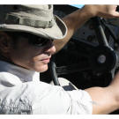 Mykel looks around for a good place to stop the vehicle as it begins to break down.