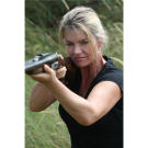 Ruth gets in some target practice after the shoot.