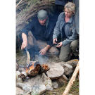 It's never pretty, but there are some moments during a survival mission that feel like true blessings. Now that the Hawkes have braved a storm, and have food, water, shelter, and fire, they can enjoy a bountiful meal featuring abundant shellfish that Ruth harvested along the Tasmanian shoreline.