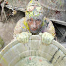 At the San Francisco city dump, Mike Rowe learns how to sort and recycle old paint for use in areas of need worldwide.