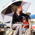 Kari Byron cozies up to Buster during the filming of Fireworks Man in 2010.