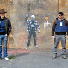 When testing whether you can jump out of the way of a bullet, it is best to don bulletproof gear, as you'll see Adam Savage and Jamie Hyneman have done here.