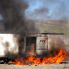 At the hands of Kari Byron, Tory Belleci and Grant Imahara, a wine truck — filled, yes, with a lot of wine and champagne — explodes at the Alameda Bomb Range. (Look away if you're a wine fan. Look away.)