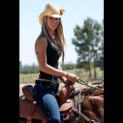 Just as natural as her love of firearms, Paige takes to horseback riding as an essential part of life out West.