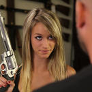 Paige shows a customer one of the custom magnum revolvers.