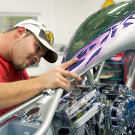 Paul Jr. works on the final assembly of the second Fantasy Bike (2005).