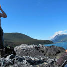 After a cleansing swim in one of the nearby lakes, one production crew member slathers on DEET, the only defense against the constant swarms of biting flies, mosquitoes and no-see-ums.