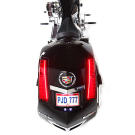 Senior and Junior are donating the proceeds from their one-of-a-kind Cadillac-inspired choppers to benefit charity.