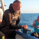Dave mulls over the upcoming dive while Cody takes on a deck job. Does Cody's commitment to going barefoot bar him from wearing fins?