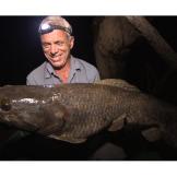 Jeremy Wade with a wolf fish. This fish's most distinguishing feature is its extensive set of teeth. Not only does the wolf fish have multiple rows of teeth lining its jaws, but its throat is also covered with serrated teeth..
