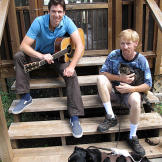 John with Greg Pike playing guitar.