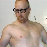 Adam Savage, circa 2005! Here, Adam tests whether you can murder someone by dropping an electrical appliance into a bathtub, a Hollywood staple.