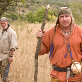 Cody and Dave pit their skills against classic African bush country of Kwazulu-Natal Province, South Africa. Because of the imminent threat of predators, they were given a machete that at least allows them to fashion rudimentary weapons like the sharpened staff that Cody holds. Everything else — including the ostrich egg canteen — is up to them.