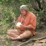 Cody's like a kid in a candy factory when he finds an ostrich egg, a bone-hard shell used by local Bushmen as a water carrier.