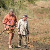 The search for water and prey always leads to watering holes, but since it's the dry season there's not much left at most of them but well-tracked mud. Still these spots act as animal magnets and offer the only hope of finding moisture.