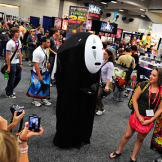 Described as a "mysterious man," No-Face consumes — and vomits — servants and produces gold coins in the film. So these attendees should probably watch out.