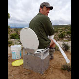 Did you ever wonder where paleontologists — who are out in the field all day digging up dinosaur bones — go to poop?
Well, wonder no more; they rely on a portable porter pot like this one.