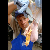 The cow bladders — primarily male beef cow ones — are purged and trimmed as preparation to their inflation.