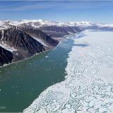 Sea ice along Canada's Arctic coast begins to break up.