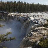 A frozen Arctic river flows after 6 months locked in ice.