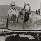 In 1935, John bought his first car, this Ford Model T for two dollars. Not long after he started driving the car some drunk boys ran into him. Instead of involving the police, they paid John $30 and he kept the car. For $1.50 he was able to fix it and continue driving it!