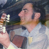 An accomplished musician since his teenage years, John often got out a guitar to entertain at all kinds of gatherings, often performing his own country and bluegrass material.