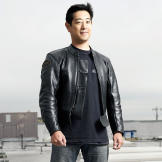 Grant Imahara poses atop M5 for a Discovery Channel photo shoot in August 2007.