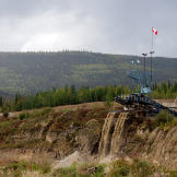 At a claim along the road from Dawson City, a massive wash plant processes multiple tailing streams. Mining operations - past and present - are the most common signs of civilization outside of town.