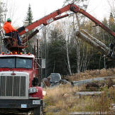 Cranes are just one of the many menacingly efficient machines loggers use to get the job done.