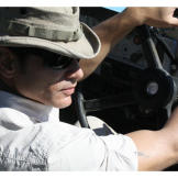Mykel looks around for a good place to stop the vehicle as it begins to break down.