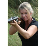 Ruth gets in some target practice after the shoot.