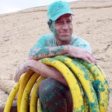 Mike Rowe learns hydro-seeding, a planting process that uses lawn seed, fiber, water and binding agents to establish a lush, healthy lawn.