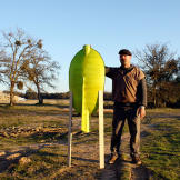 Is it possible that torpedoes date back to the 1300s? Jamie Hyneman poses with his rendition of a possible ancient torpedo.