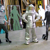 In preparation for "Exploding Wine," Grant Imahara strikes a jaunty pose in his fireproof suit.
