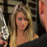 Paige shows a customer one of the custom magnum revolvers.