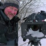 Filming bison and wolves in the Canadian High Arctic.