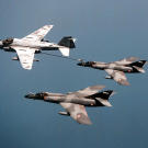 Merci! Two French Navy Super Etendards replentish their fuel thanks to a US Navy A-6E Intruder and its belly-mounted buddy pack over the Western Mediterranean, June 1996.