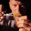 Jeremy Wade fixes a lure.