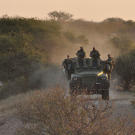 Biggs (Navy SEAL fmr.), Oz (Green Beret), Saw (Navy SEAL fmr.), Rob (Navy SEAL ret.) traveling on Reva vehicle on patrol.
