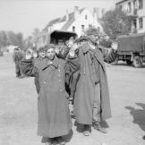 A group of German prisoners consisting mostly of boys, surrendering in Bremen, Germany, 1944.
