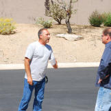 Ed Rosenberg and Doug Hopkins argue over a property.