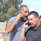 Ed Rosenberg gets in competing buyer Scott Menaged’s face while bidding on a property.