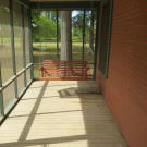 A screened-in patio is a must for enjoying those warm nights in the bayou...and to keep those pesky mosquitoes away.