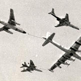 Something for everyone! Travelling at 415 mph, this modified B-29 refuels an F-101A Voodoo, a B-66 Destroyer, and a F-100D Super Sabre somewhere over England in the early 1960s.