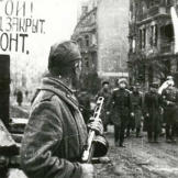 Delegation of German officers walking for negotiations before capitulation of Festung Breslau, May 6th, 1945. The Russian siege of Breslau had lasted three months. The sign reads