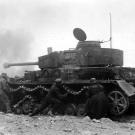 Under intense fire, this German crew works feverishly to get their track back on the road, Monte Cassino, Italy, January 1944.
Watch video of the