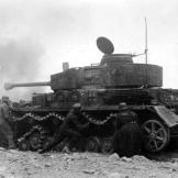 Under intense fire, this German crew works feverishly to get their track back on the road, Monte Cassino, Italy, January 1944.
Watch video of the