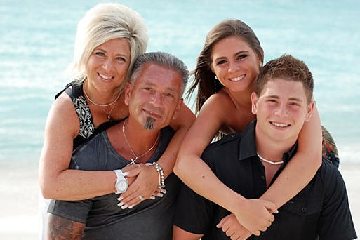 Theresa Caputo and Larry Caputo with their children