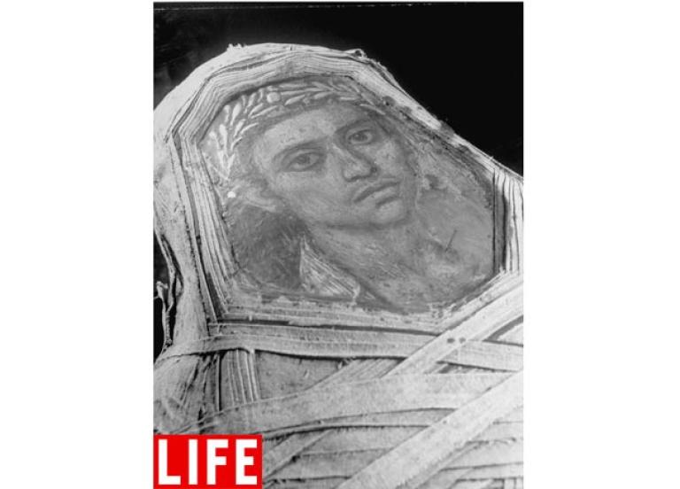 Commemorated in Portrait. This encaustic mummy portrait, done with hot wax and colored pigments, shows a burial from the Hellenistic period in the Egyptian collection of the Metropolitan Museum of Art in New York.